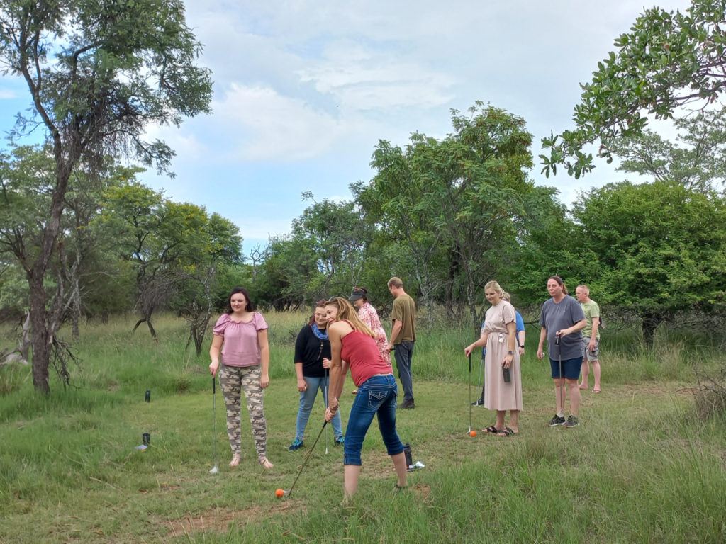Guests playing Bush Golf on 9-hole course at Sun Acres Farm